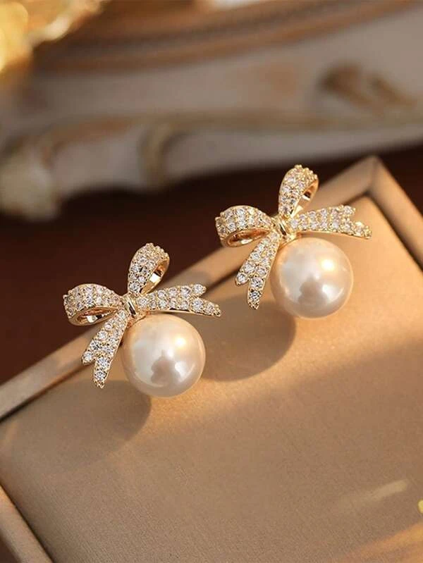 Brincos com laço de strass  & design de pérola - Dourado